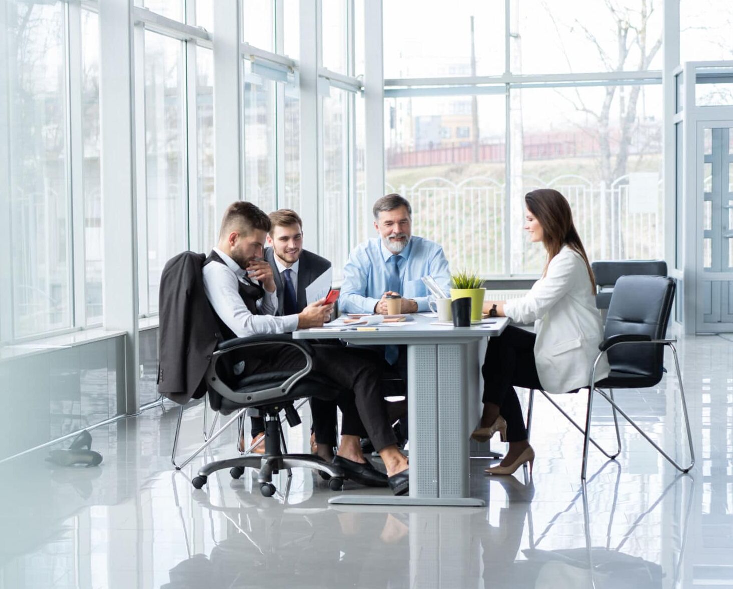 Businesspeople discussing together in conference room during meeting at office